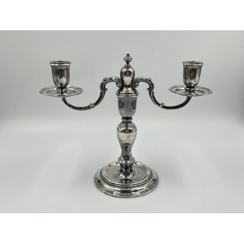 1240 - An Elizabeth II Cornelius Joshua Vander Ltd hallmarked London silver two branch candelabra, dated 19... 