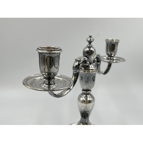 1240 - An Elizabeth II Cornelius Joshua Vander Ltd hallmarked London silver two branch candelabra, dated 19... 