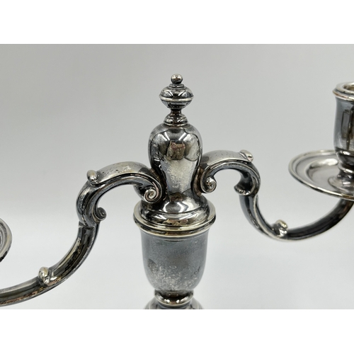 1240 - An Elizabeth II Cornelius Joshua Vander Ltd hallmarked London silver two branch candelabra, dated 19... 