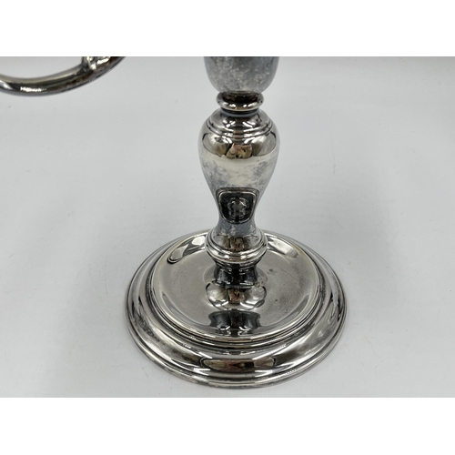 1240 - An Elizabeth II Cornelius Joshua Vander Ltd hallmarked London silver two branch candelabra, dated 19... 