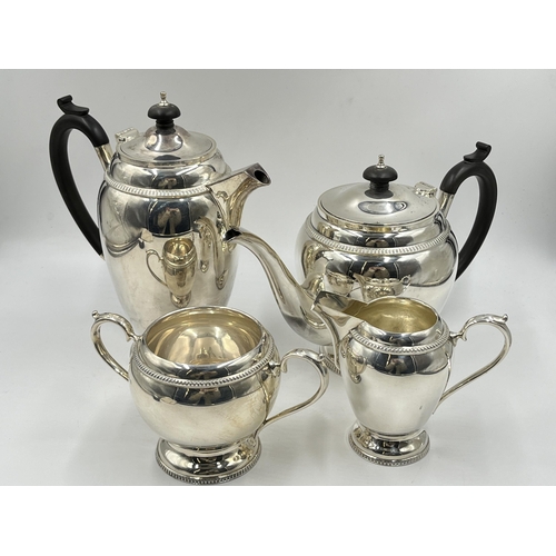 1241 - An Elizabeth II Walker & Hall hallmarked Sheffield silver four piece tea/coffee set comprising 24cm ... 