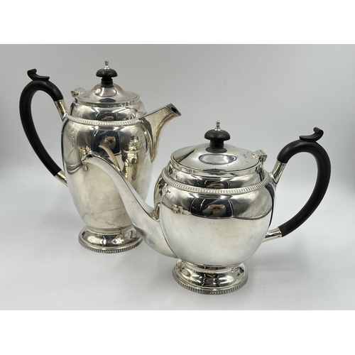 1241 - An Elizabeth II Walker & Hall hallmarked Sheffield silver four piece tea/coffee set comprising 24cm ... 