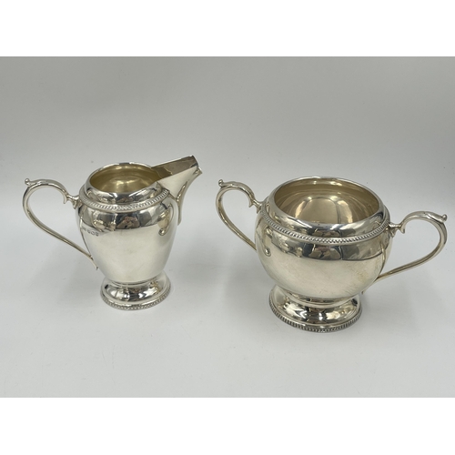 1241 - An Elizabeth II Walker & Hall hallmarked Sheffield silver four piece tea/coffee set comprising 24cm ... 