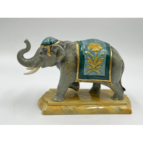 174 - A boxed Halcyon Days porcelain elephant figurine - approx. 9.5cm high x 16cm long