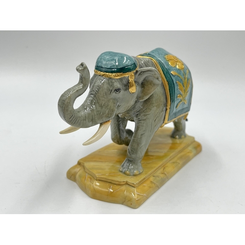 174 - A boxed Halcyon Days porcelain elephant figurine - approx. 9.5cm high x 16cm long