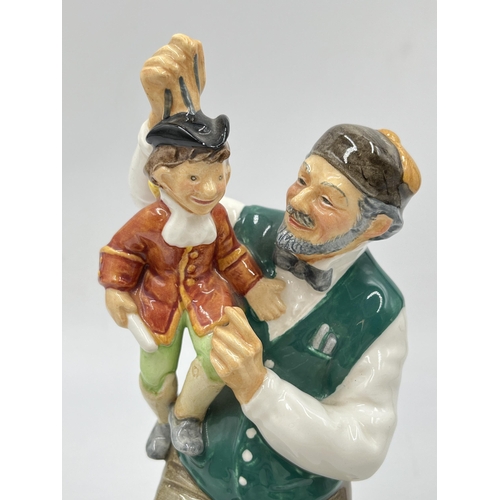 176 - A Royal Doulton The Puppetmaker figurine - HN 2253