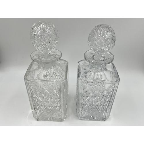 181 - Two Thomas Webb cut crystal decanters - largest approx. 25cm high