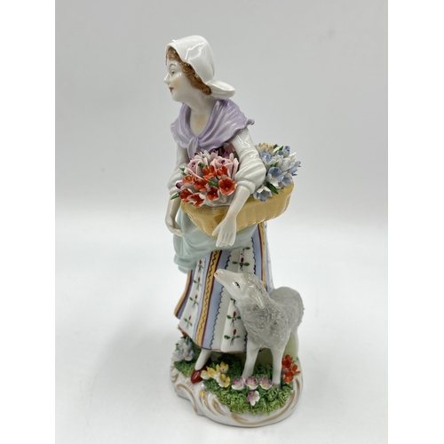 184 - A Sitzendorf hand painted porcelain lady flower seller figurine - approx. 18cm high