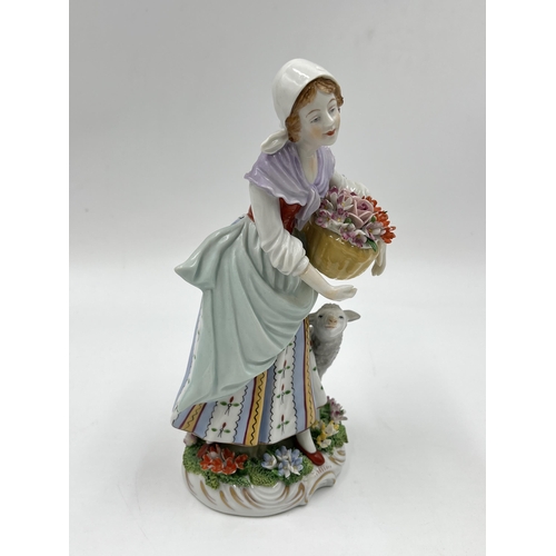 184 - A Sitzendorf hand painted porcelain lady flower seller figurine - approx. 18cm high