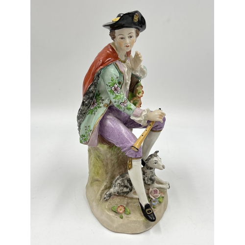 187 - A Sitzendorf hand painted porcelain figurine of a gentleman holding flute with dog - approx. 19cm hi... 