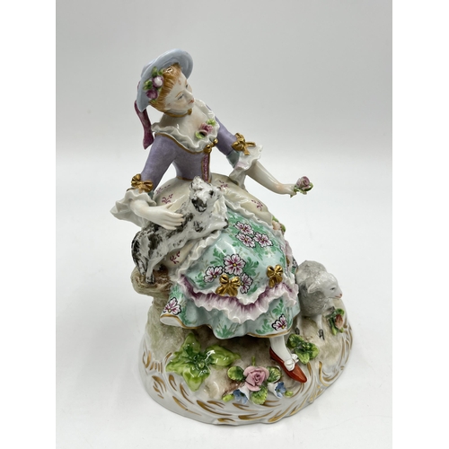 188 - A Sitzendorf hand painted porcelain figurine of a lady with dog and sheep - approx. 15cm high