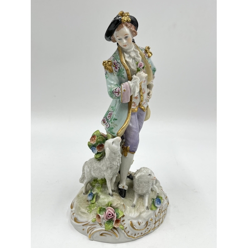 191 - A Sitzendorf hand painted porcelain figurine of a gentleman with sheep - approx. 17.5cm high