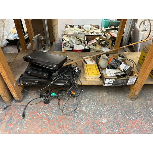 918 - A collection of house clearance items to include Polaroid DVD player, Toshiba SD-38VB DVD video play... 