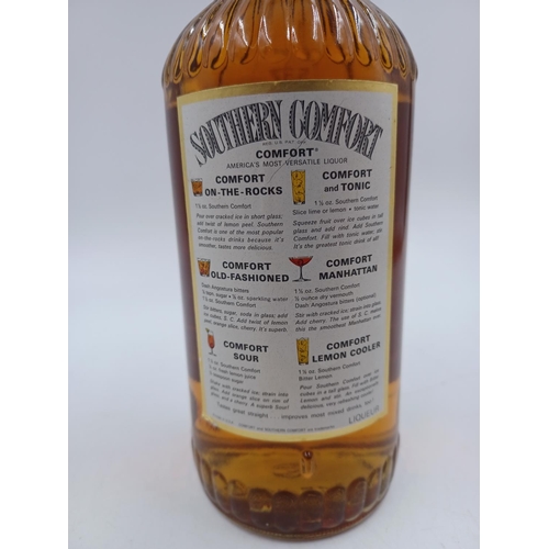 537 - An old 26.4 fl. oz./75cl bottle of Southern Comfort whiskey liqueur - bottled at 87.7°