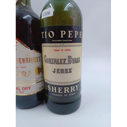 592A - Four bottles of fortified wine, one 75cl Henriques & Henriques special dry Madeira - bottled at 19%,... 