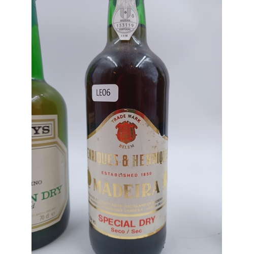 592A - Four bottles of fortified wine, one 75cl Henriques & Henriques special dry Madeira - bottled at 19%,... 