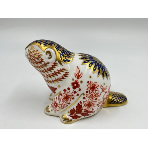 264 - A Royal Crown Derby Beaver paperweight with gold stopper