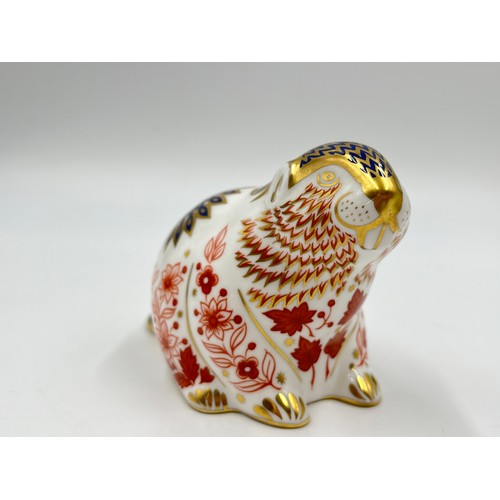 264 - A Royal Crown Derby Beaver paperweight with gold stopper