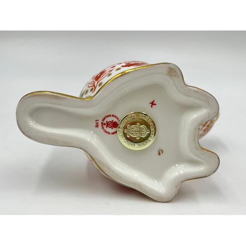 264 - A Royal Crown Derby Beaver paperweight with gold stopper