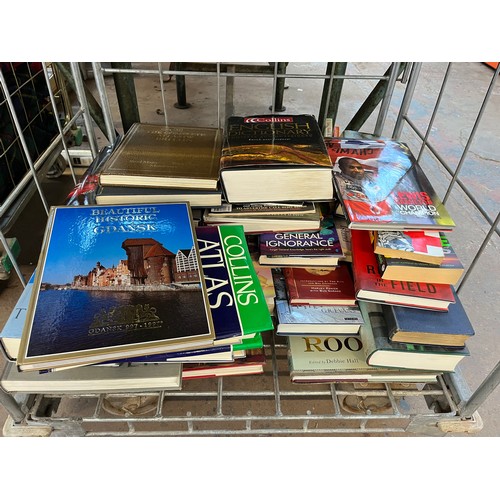 919 - A cage containing a large quantity of books (cage not included)