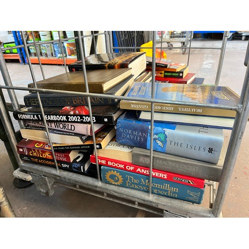 919 - A cage containing a large quantity of books (cage not included)