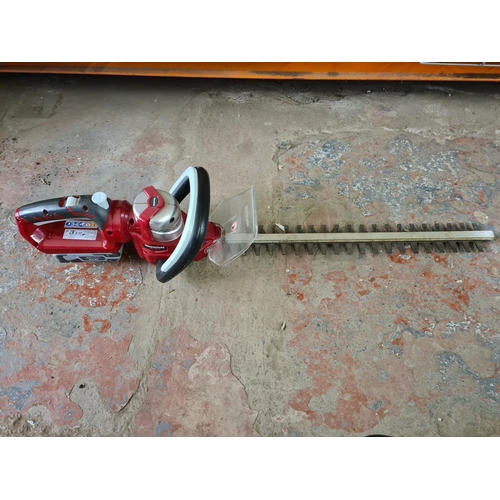 878 - A collection of tools to include boxed Parkside PSG85B2 chain sharpener, Mountfield cordless hedge c... 