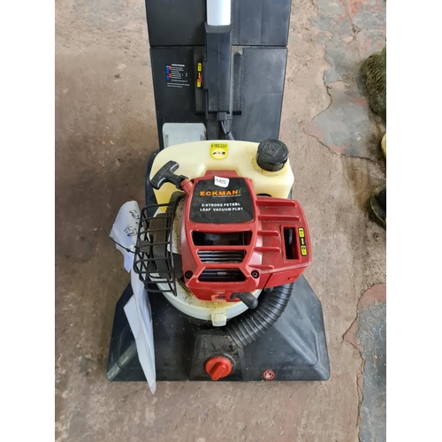 897 - An Eckman PLB1 2 stroke petrol leaf vacuum with instruction manual