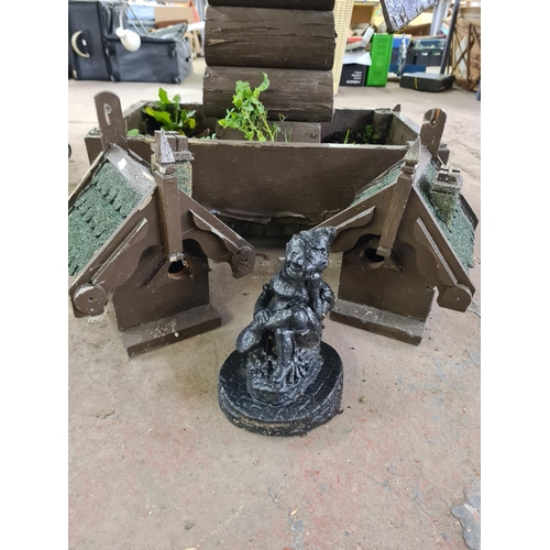 898 - Three wooden garden items, one windmill planter and two bird houses - windmill approx. 140cm high