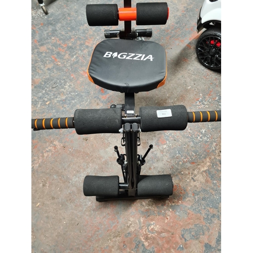 911 - A Bigzzia 8in1 adjustable core and ab exercise trainer