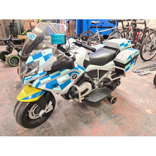 917 - A BMW R200RT electric police motorbike with charger