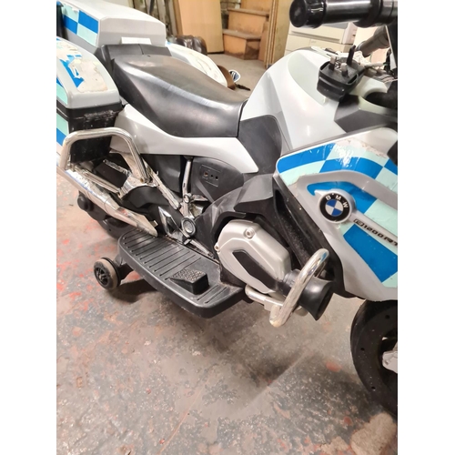 917 - A BMW R200RT electric police motorbike with charger