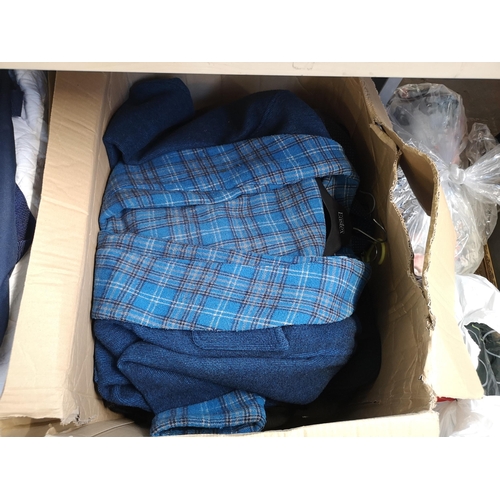 956 - Five boxes containing a large quantity of clothing, shoes and bed linen