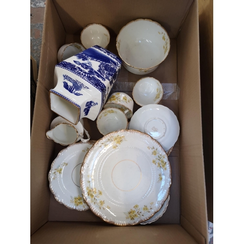 967 - Two boxes containing ceramics to include Ringtons Willow Story vase, Carlton Ware Rouge Royale trink... 