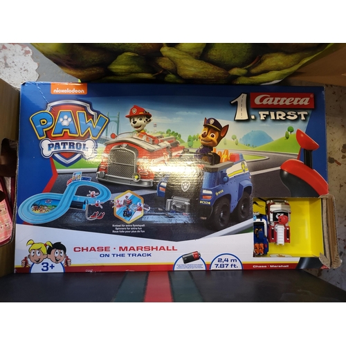 977 - A collection of toys and games to include Paw Patrol Chase Marshal track set, Our Generation by Batt... 