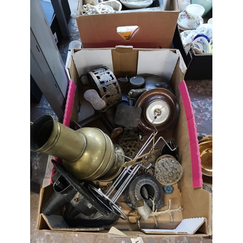 984 - Four boxes containing metalware to include Victorian copper and brass coal bucket, silver plated cut... 