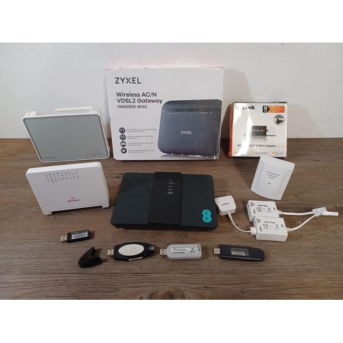 771 - A collection of items to include, boxed and sealed Zyxel wireless gateway, boxed D-Link wireless USB... 