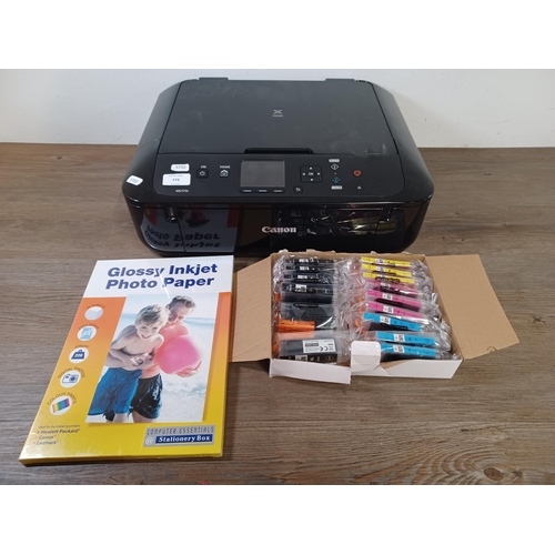 773 - A Canon Pixma MG5750 all-in-one wireless printer with ink cartridges