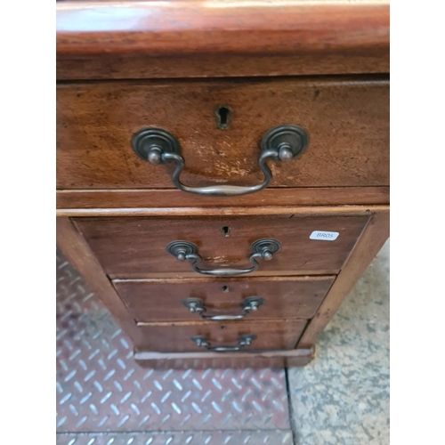 25 - An Edwardian mahogany pedestal desk with nine drawers and beige leather insert - approx. 73cm high x... 