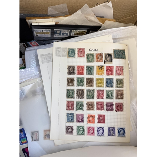 938 - A box containing a large quantity of worldwide stamps