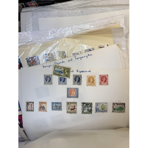 938 - A box containing a large quantity of worldwide stamps