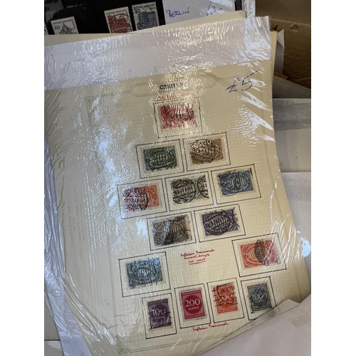 938 - A box containing a large quantity of worldwide stamps