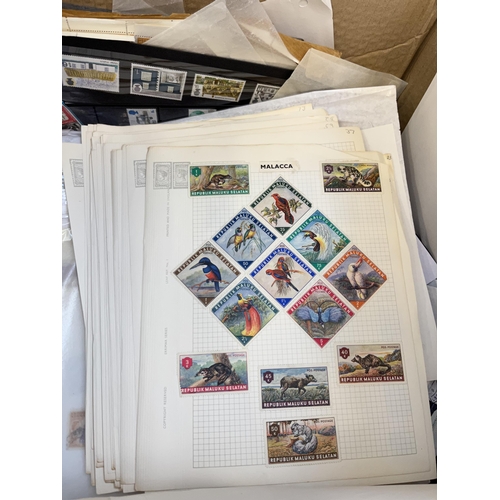 938 - A box containing a large quantity of worldwide stamps