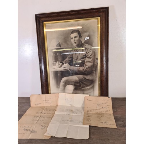 535 - A collection of WWI and WWII ephemera to include framed photograph of S.W Boulton of The 4th Bn. Che... 