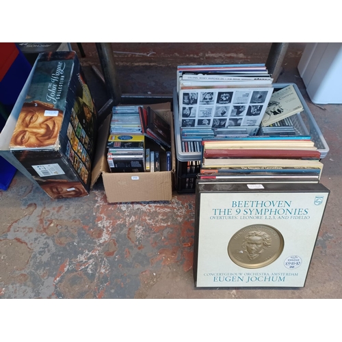 755A - A collection of items to include classical LP vinyl box sets, two boxes containing a collection of c... 