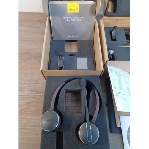 780 - Two boxed Jabra Hands-Free-Communication wireless telephone headsets, one Pro 9465 duo and one Pro 9... 