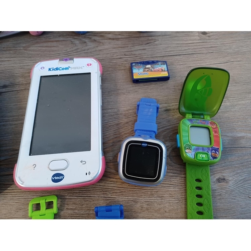 784 - Nine children's electronic items to include cameras, smart watches and tablets