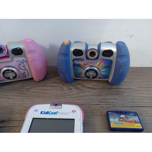 784 - Nine children's electronic items to include cameras, smart watches and tablets