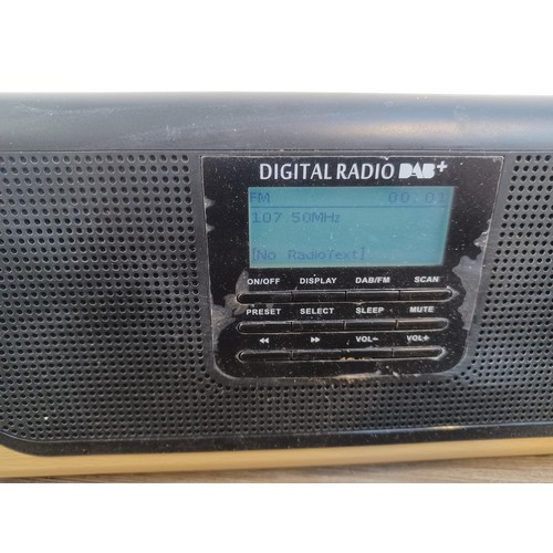 696 - A collection of radios and speakers to include Roberts, Pure, iHome etc.