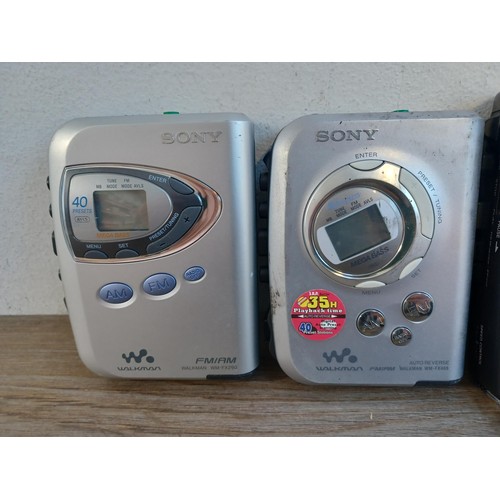 700 - Six Sony Walkman personal stereos to include TCS-580V cassette player/recorder, WM-FX43 radio/casset... 