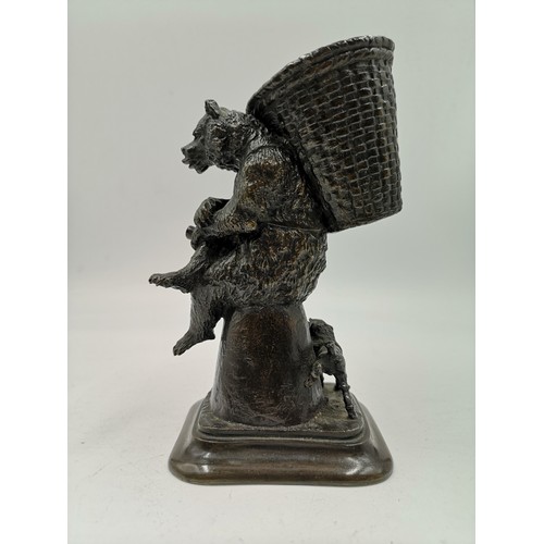 511 - A bronzed cast metal study of a seated bear with basket in the manner of Christophe Fratin - approx.... 